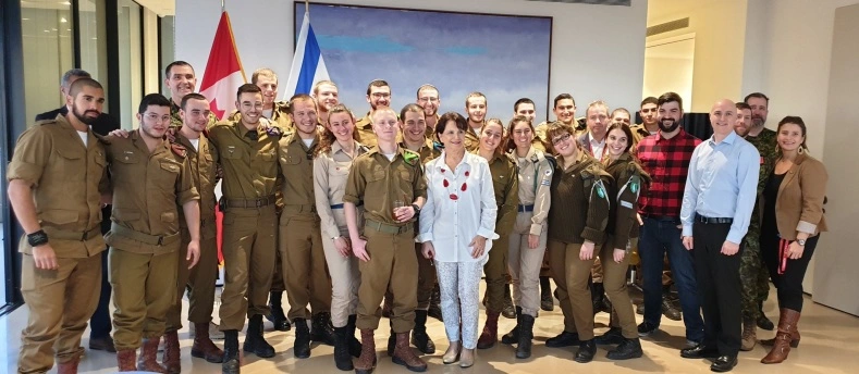 A photo of soldiers at the pizza party held by Deborah Lyons at Canada's embassy in Israel